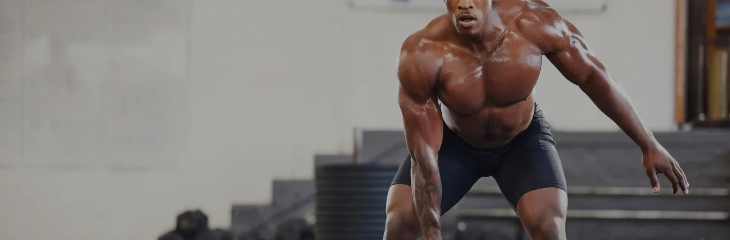 Athletic man sprinting outdoors during a high-intensity workout